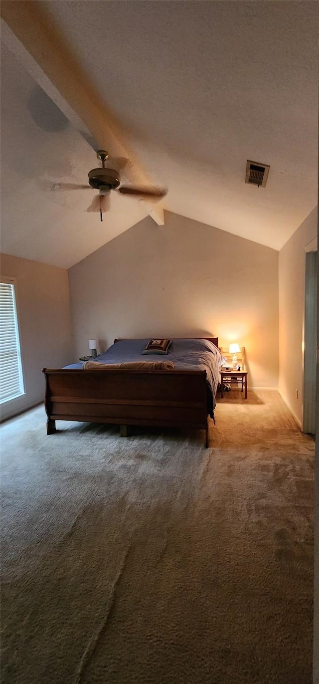 532 S Rivershire Dr, Conroe, TX 77304 - carpeted bedroom featuring lofted ceiling and ceiling fan