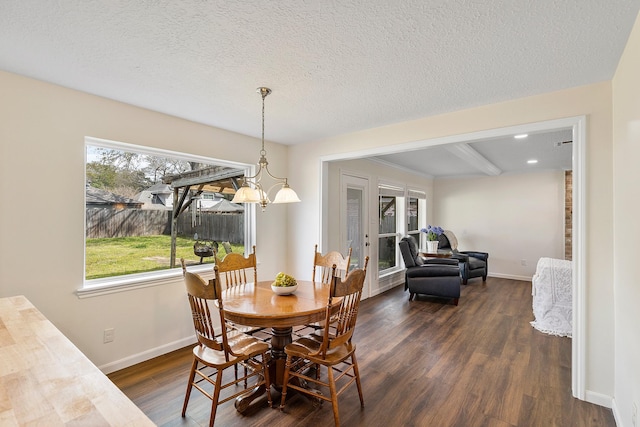 dining area with dark wood-style flooring, baseboards, recessed lighting, a textured ceiling, and french doors