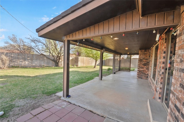 view of patio with a fenced backyard