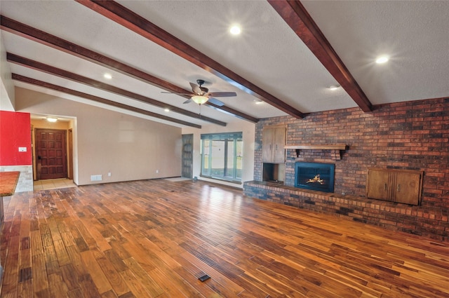 unfurnished living room with a fireplace, ceiling fan, baseboards, and hardwood / wood-style floors