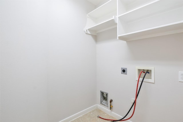 washroom featuring gas dryer hookup, laundry area, electric dryer hookup, baseboards, and hookup for a washing machine