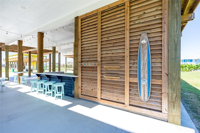 exterior space featuring outdoor dry bar