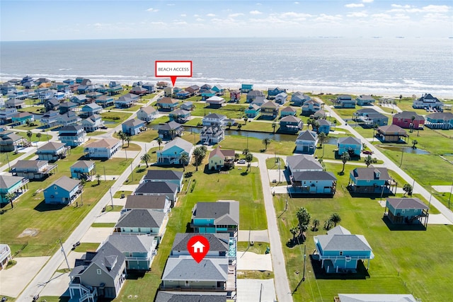 aerial view with a residential view and a water view