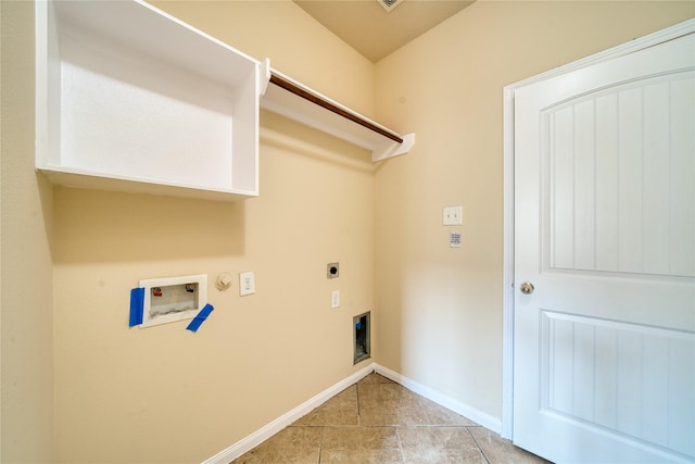 24618 Malca Manor Dr, Katy, TX 77493 - laundry area with hookup for an electric dryer, laundry area, light tile patterned floors, baseboards, and hookup for a washing machine