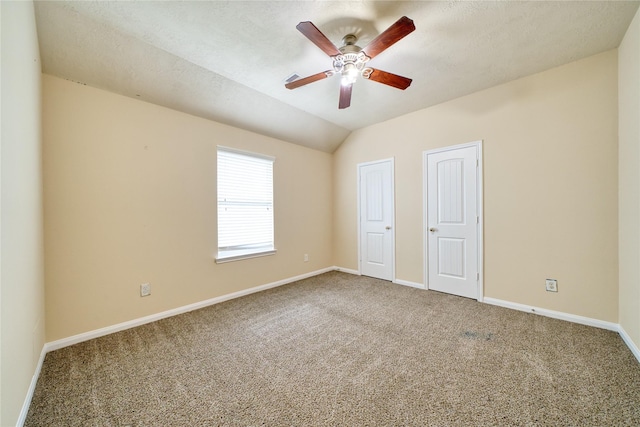 24618 Malca Manor Dr, Katy, TX 77493 - unfurnished bedroom with carpet floors, baseboards, and vaulted ceiling