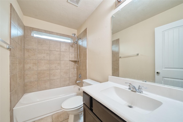 24618 Malca Manor Dr, Katy, TX 77493 - bathroom featuring visible vents, vanity, tub / shower combination, toilet, and a textured ceiling