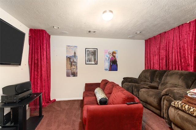 24618 Malca Manor Dr, Katy, TX 77493 - carpeted living area with visible vents, a textured ceiling, and baseboards