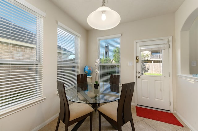 24618 Malca Manor Dr, Katy, TX 77493 - dining room with light tile patterned flooring and baseboards