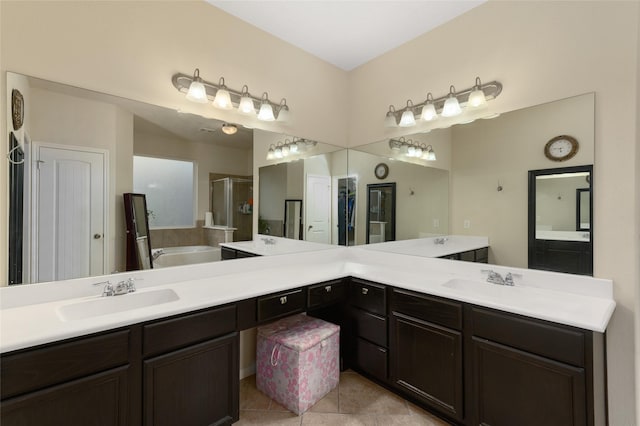 24618 Malca Manor Dr, Katy, TX 77493 - bathroom with vanity, a stall shower, a garden tub, and tile patterned floors