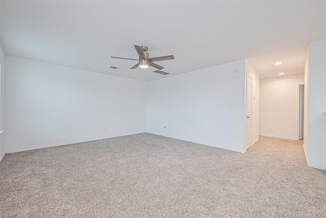 12518 Pelican Bay Dr, Houston, TX 77038 - unfurnished room featuring visible vents, a ceiling fan, and light colored carpet