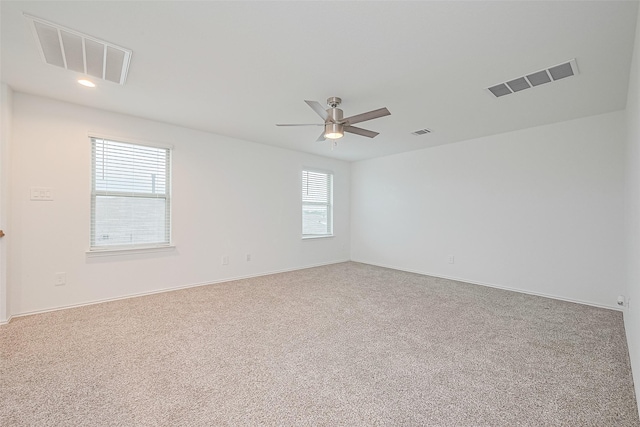 12518 Pelican Bay Dr, Houston, TX 77038 - unfurnished room featuring visible vents, a ceiling fan, and carpet
