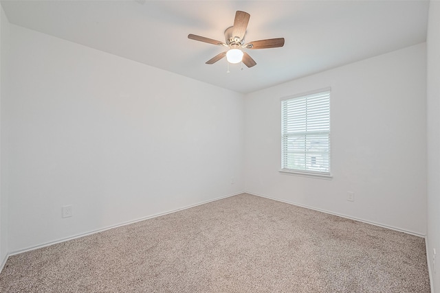 12518 Pelican Bay Dr, Houston, TX 77038 - spare room with baseboards, ceiling fan, and carpet