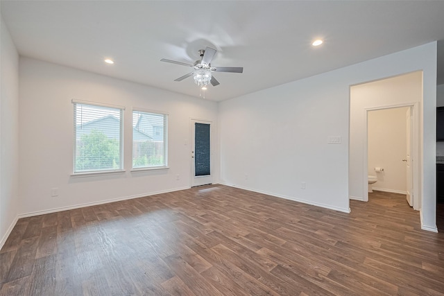 12518 Pelican Bay Dr, Houston, TX 77038 - unfurnished room featuring dark wood-type flooring, a ceiling fan, baseboards, and recessed lighting