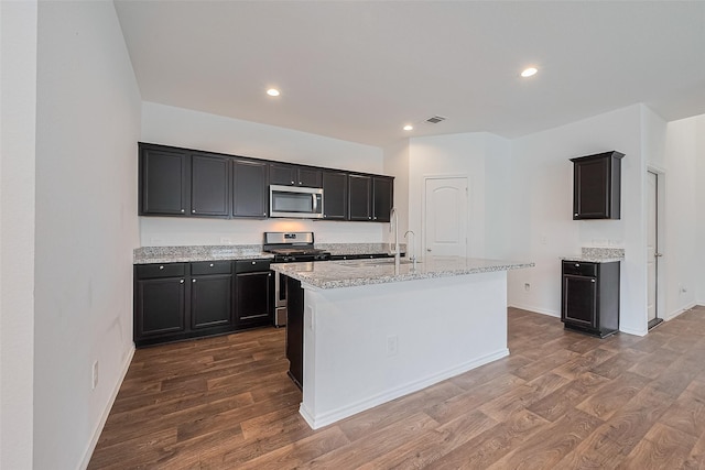 12518 Pelican Bay Dr, Houston, TX 77038 - kitchen featuring a sink, stainless steel appliances, dark wood-style floors, and visible vents