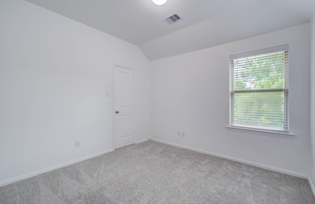 3730 Bach St, Iowa Colony, TX 77583 - carpeted spare room with lofted ceiling and baseboards