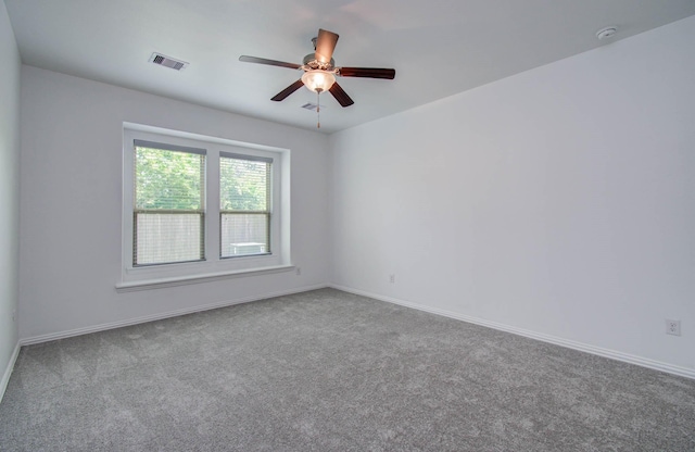 3730 Bach St, Iowa Colony, TX 77583 - spare room featuring carpet floors, a ceiling fan, and a smoke detector