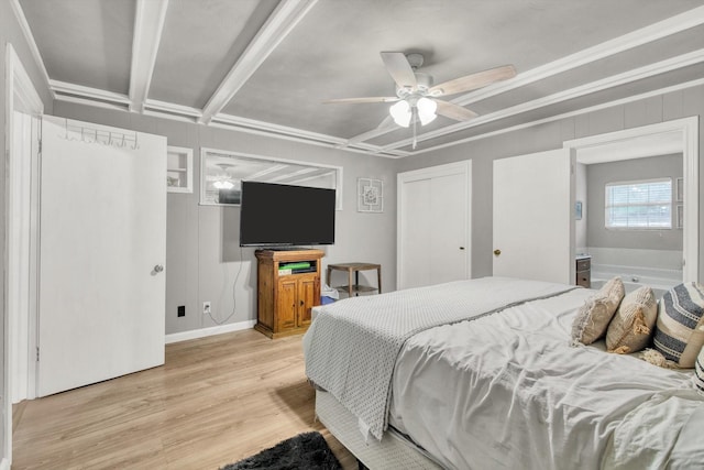 307 N St, Baytown, TX 77520 - bedroom featuring baseboards, ceiling fan, and light wood finished floors