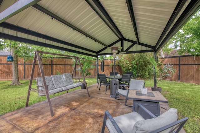 307 N St, Baytown, TX 77520 - view of patio / terrace featuring a fenced backyard and outdoor dining space