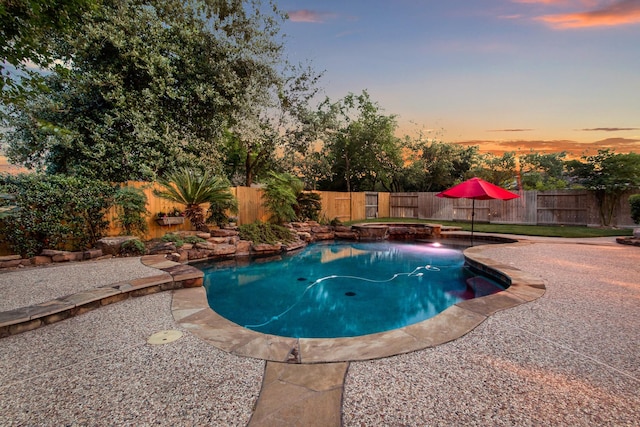 view of pool featuring a fenced backyard and a fenced in pool