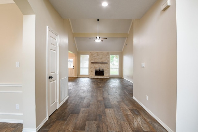 241 Blue Hill Dr, Montgomery, TX 77356 - unfurnished living room with a fireplace, dark wood finished floors, a ceiling fan, baseboards, and vaulted ceiling