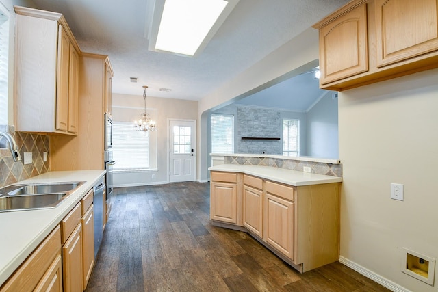 241 Blue Hill Dr, Montgomery, TX 77356 - kitchen featuring light brown cabinetry, a chandelier, a sink, and dark wood finished floors