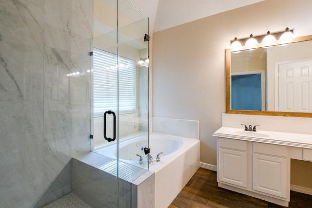 241 Blue Hill Dr, Montgomery, TX 77356 - bathroom featuring vanity, a stall shower, a bath, and wood finished floors