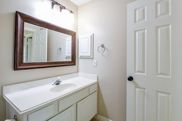 241 Blue Hill Dr, Montgomery, TX 77356 - bathroom featuring vanity and baseboards