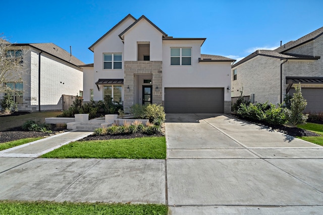 modern home featuring concrete driveway, an attached garage, stone siding, and stucco siding