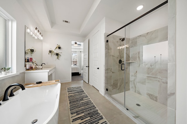 bathroom featuring ceiling fan, visible vents, a shower stall, and ensuite bathroom
