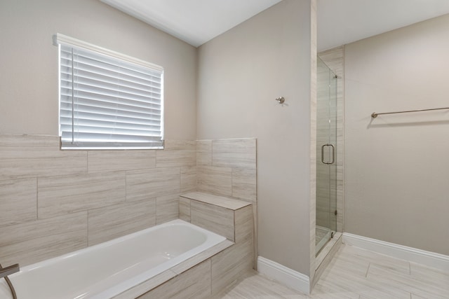 1015 Gardendale Dr, Houston, TX 77018 - full bathroom with a bath and a shower stall