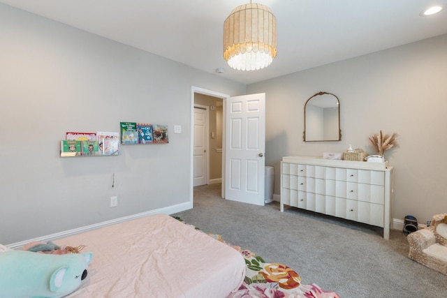 1015 Gardendale Dr, Houston, TX 77018 - bedroom with baseboards, an inviting chandelier, and carpet