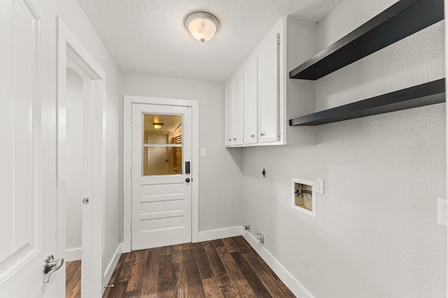 clothes washing area with hookup for an electric dryer, cabinet space, baseboards, hookup for a washing machine, and dark wood-type flooring