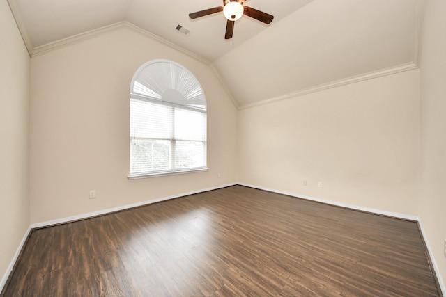 unfurnished room with a ceiling fan, dark wood-style flooring, visible vents, crown molding, and vaulted ceiling