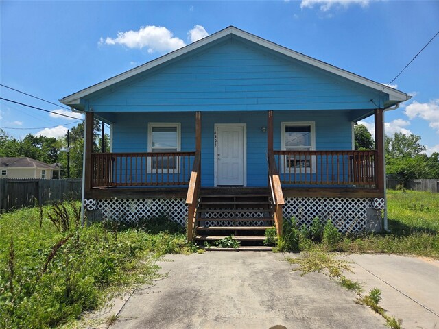 6403 O Brien St, Hitchcock, TX 77563 - view of front facade with a porch