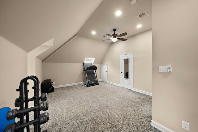 workout room featuring carpet floors, ceiling fan, lofted ceiling, and visible vents