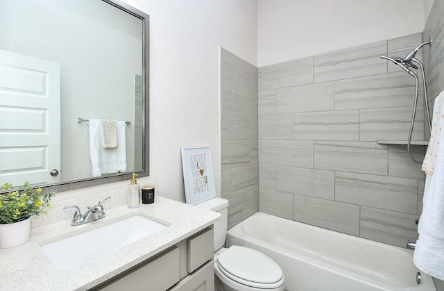 full bath featuring vanity, bathing tub / shower combination, and toilet