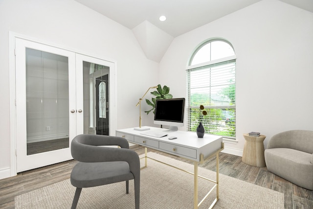 office area featuring lofted ceiling, wood finished floors, baseboards, recessed lighting, and french doors