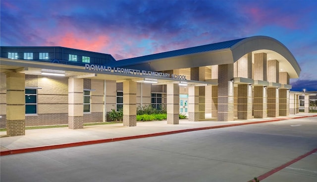 view of property at dusk