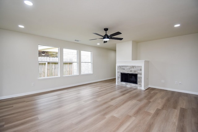 unfurnished living room with light wood-style floors, recessed lighting, and a ceiling fan