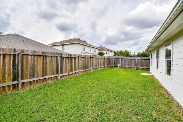 view of yard featuring a fenced backyard