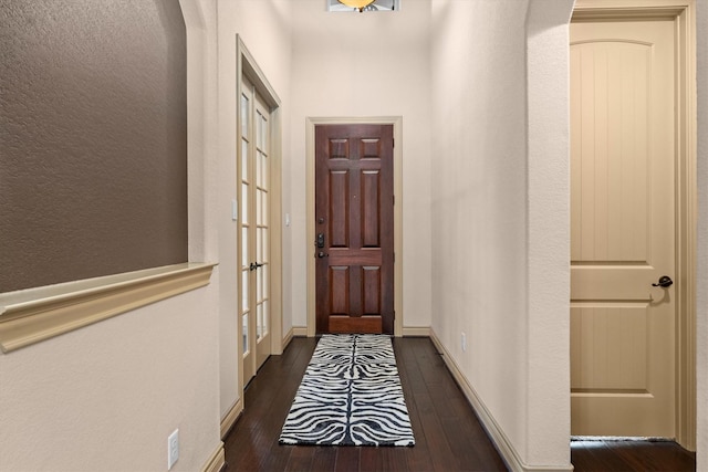 entryway featuring dark wood-style floors