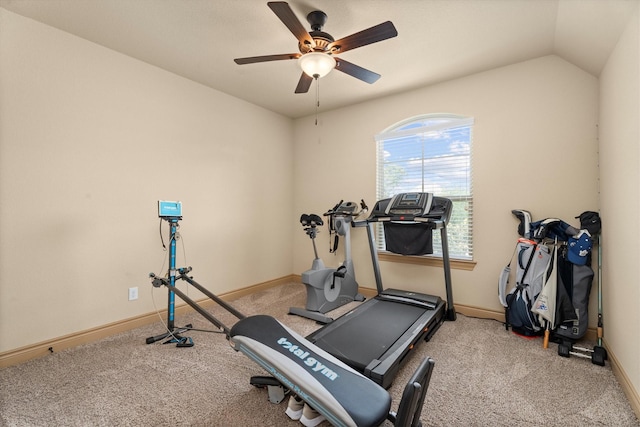 exercise room featuring baseboards, ceiling fan, carpet, and lofted ceiling