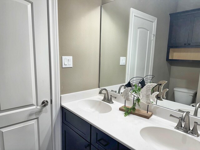 2112 Fm 3186 Unit 9, Onalaska, TX 77360 - bathroom with toilet and double vanity
