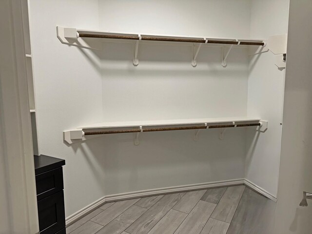 2112 Fm 3186 Unit 9, Onalaska, TX 77360 - spacious closet featuring light wood-style floors