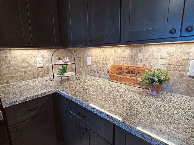 2112 Fm 3186 Unit 9, Onalaska, TX 77360 - kitchen with tasteful backsplash and blue cabinets