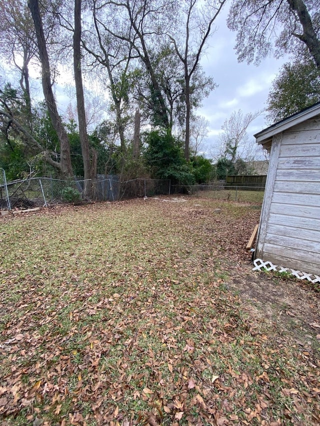 view of yard with fence