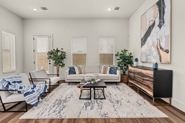 881 Rachel St Unit F, Houston, TX 77091 - living room with recessed lighting, baseboards, visible vents, and wood finished floors