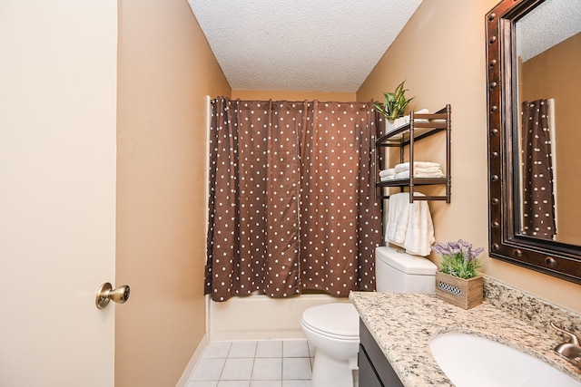 full bath with a textured ceiling, tile patterned flooring, curtained shower, vanity, and toilet