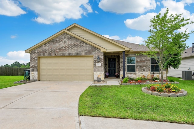 2873 S Fairway Lake Dr, Alvin, TX 77511 - single story home with an attached garage, central AC, a front lawn, brick siding, and concrete driveway