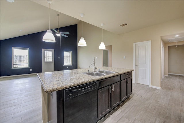 kitchen with visible vents, a sink, dishwasher, and open floor plan